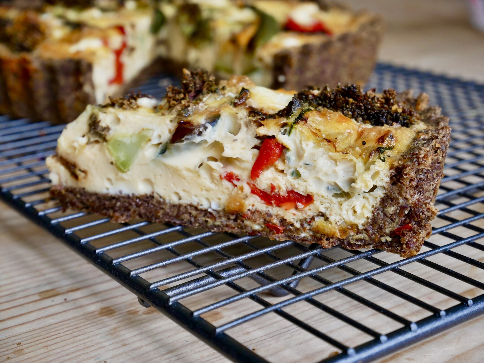 Roasted vegetable quiche with a cheddar crust